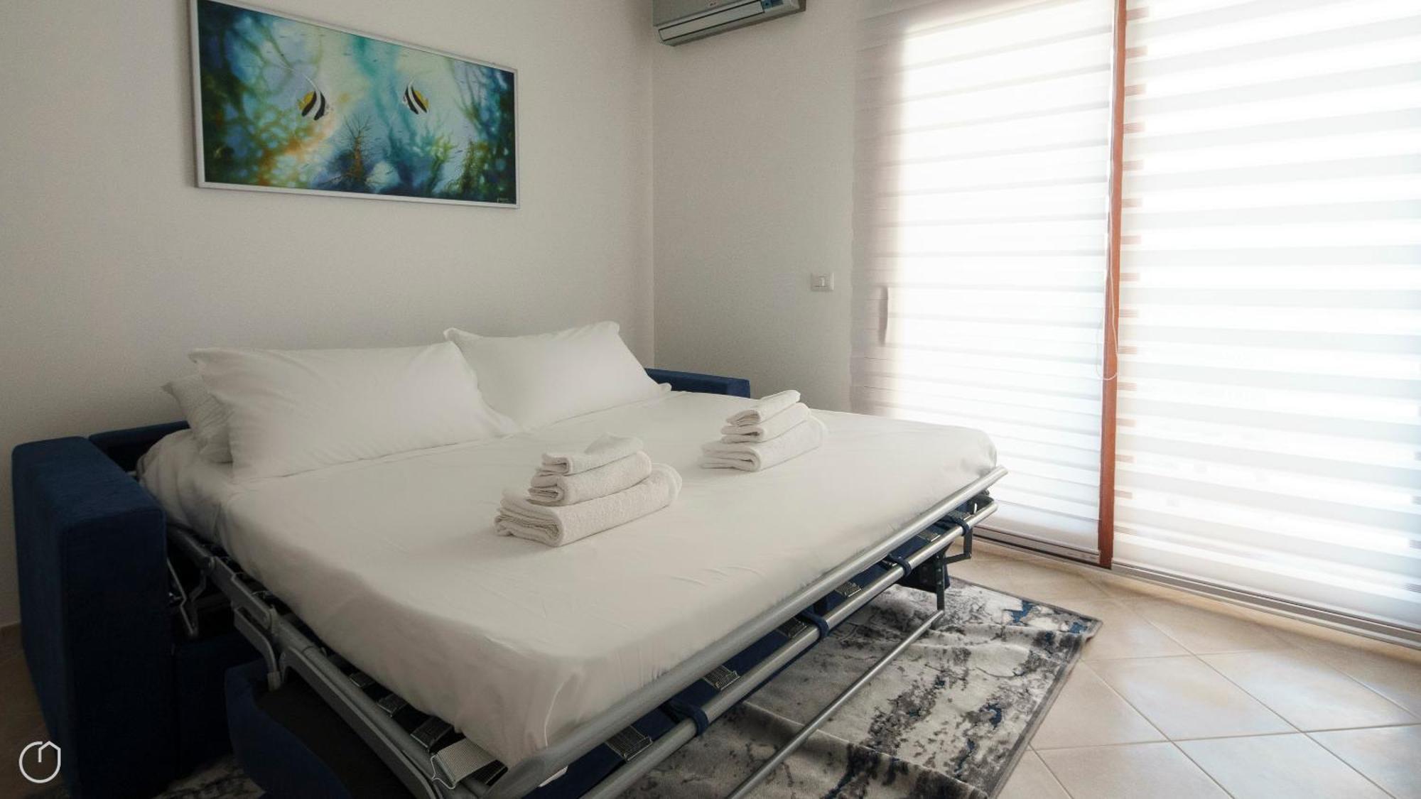 Welcomely - Xenia Boutique House Olbia Bagian luar foto